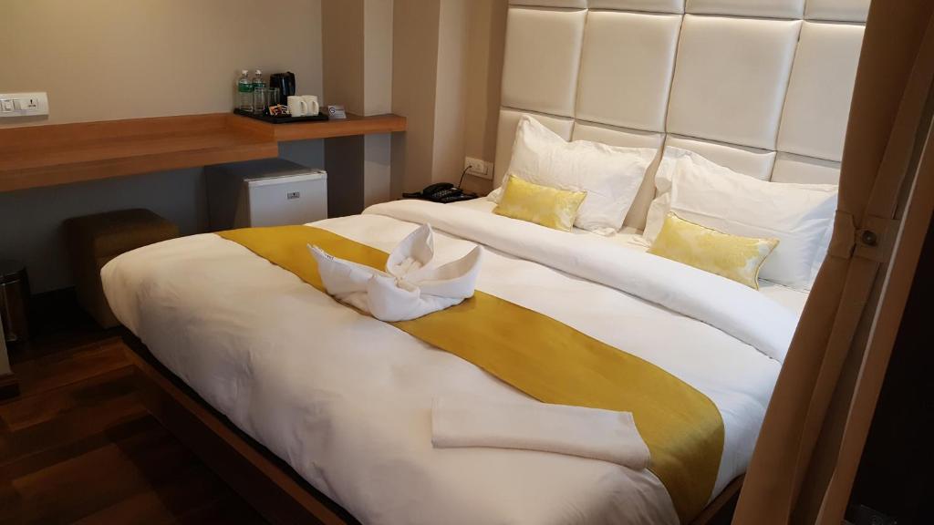 Postel nebo postele na pokoji v ubytování Hotel Bihani