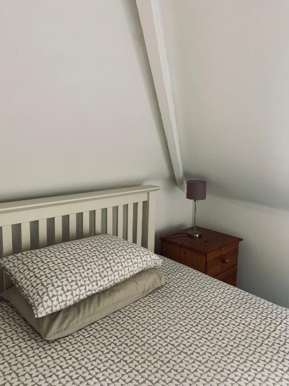 Postel nebo postele na pokoji v ubytování Rockleaze Guesthouse