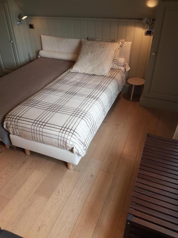 Postel nebo postele na pokoji v ubytování B & B DE SERAFIJN