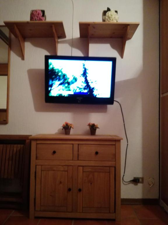 Telewizja i/lub zestaw kina domowego w obiekcie Paradiso Aremogna
