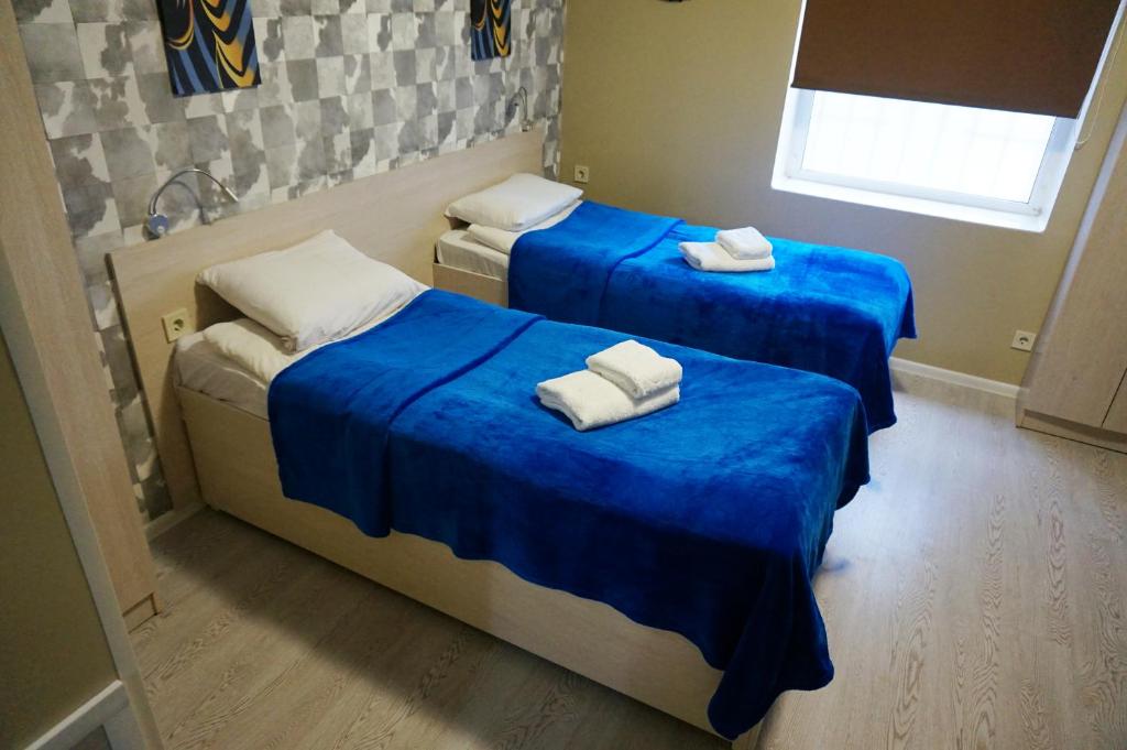 Postel nebo postele na pokoji v ubytování Kolibri