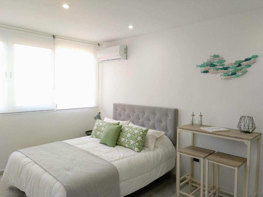 Cama o camas de una habitación en Apartamento Ojana Centro