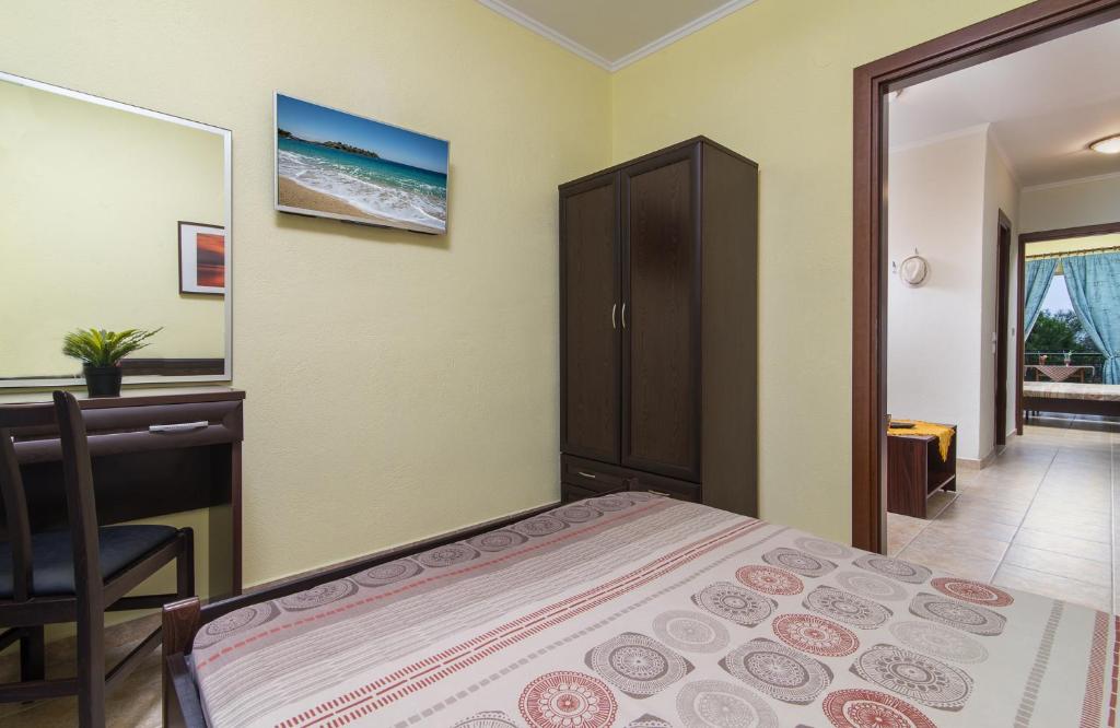 Postel nebo postele na pokoji v ubytování Sunset Studios