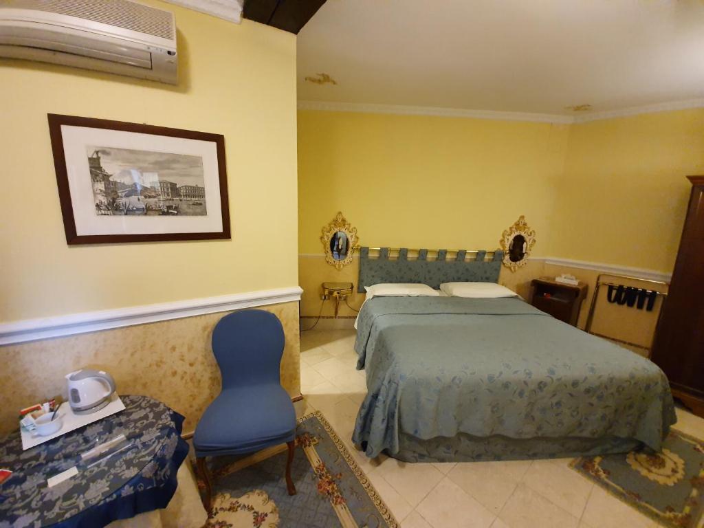 Postel nebo postele na pokoji v ubytování Casa Alla Fenice