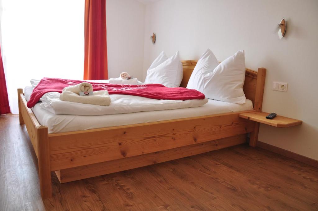 Postel nebo postele na pokoji v ubytování Haus Höllwart