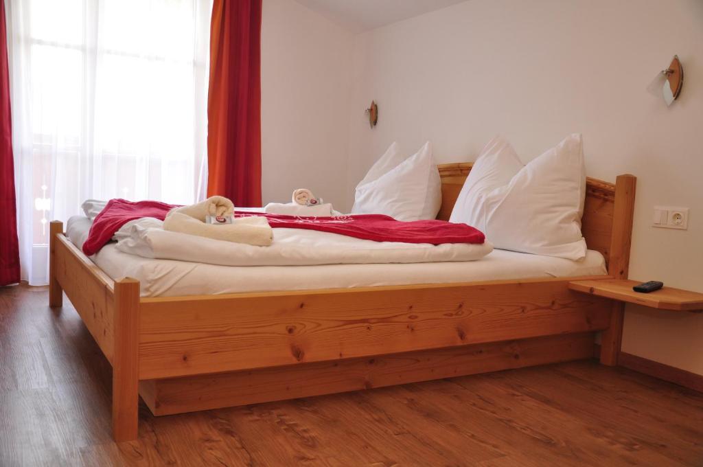 Postel nebo postele na pokoji v ubytování Haus Höllwart