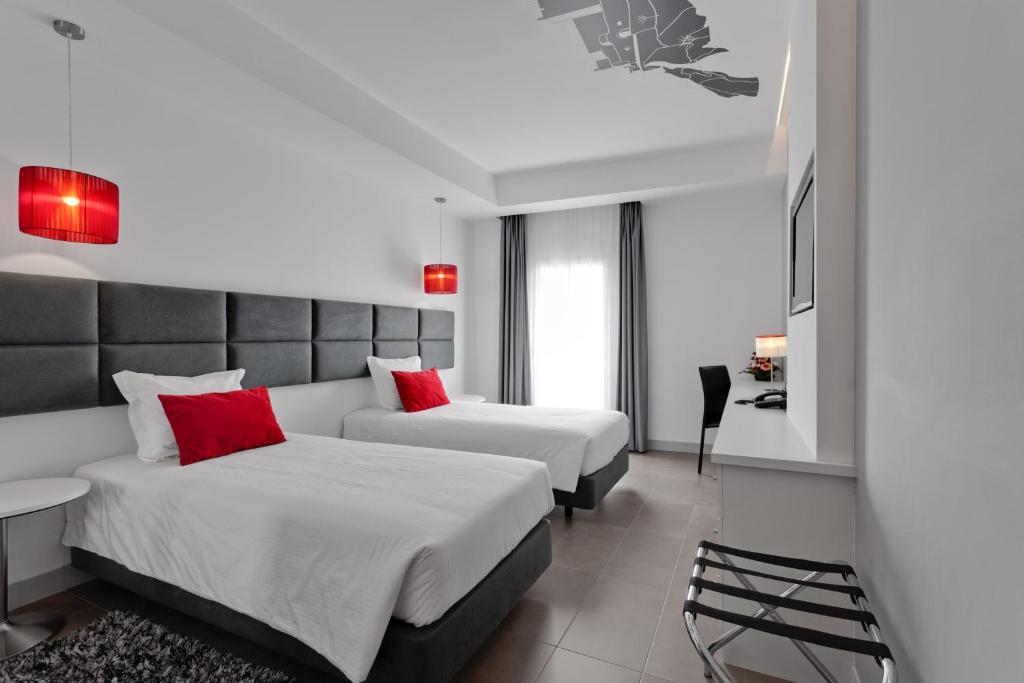 En eller flere senger på et rom på Rossio Hotel