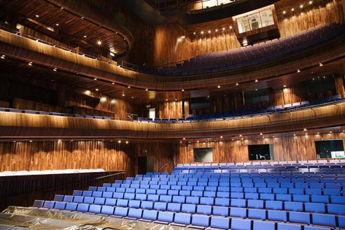 a large auditorium with blue seats in an auditorium at Glenhill B&B in Wexford