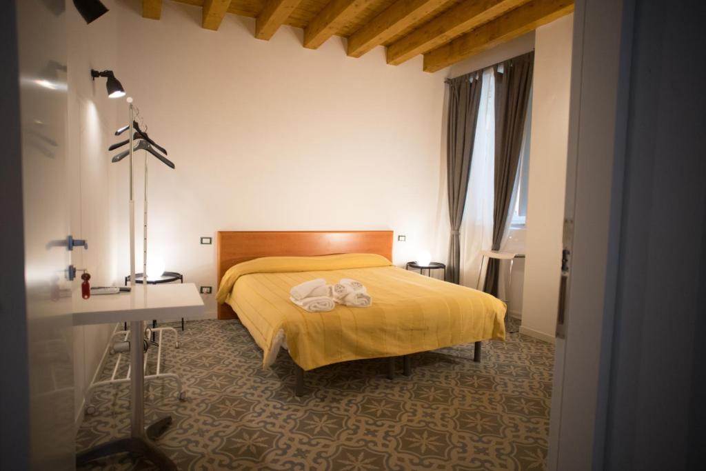 Postel nebo postele na pokoji v ubytování B&B Kolymbetra
