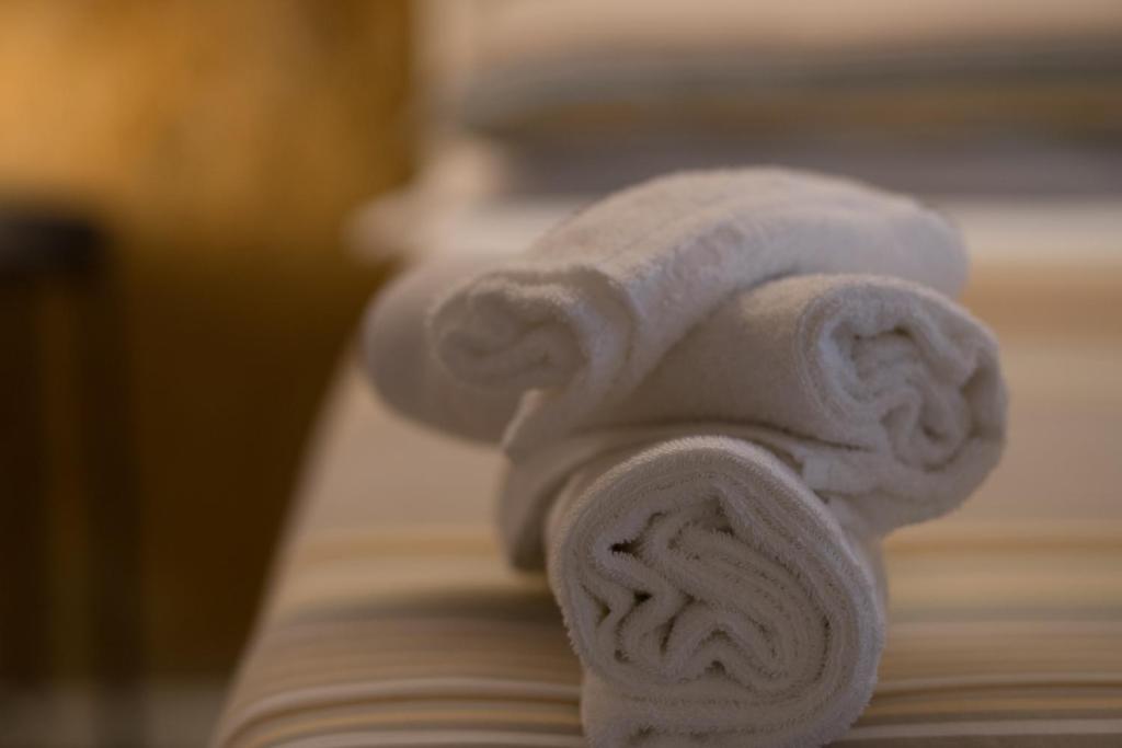 Postel nebo postele na pokoji v ubytování B&B Kolymbetra
