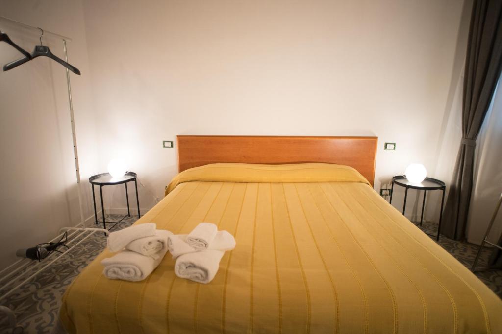 Postel nebo postele na pokoji v ubytování B&B Kolymbetra