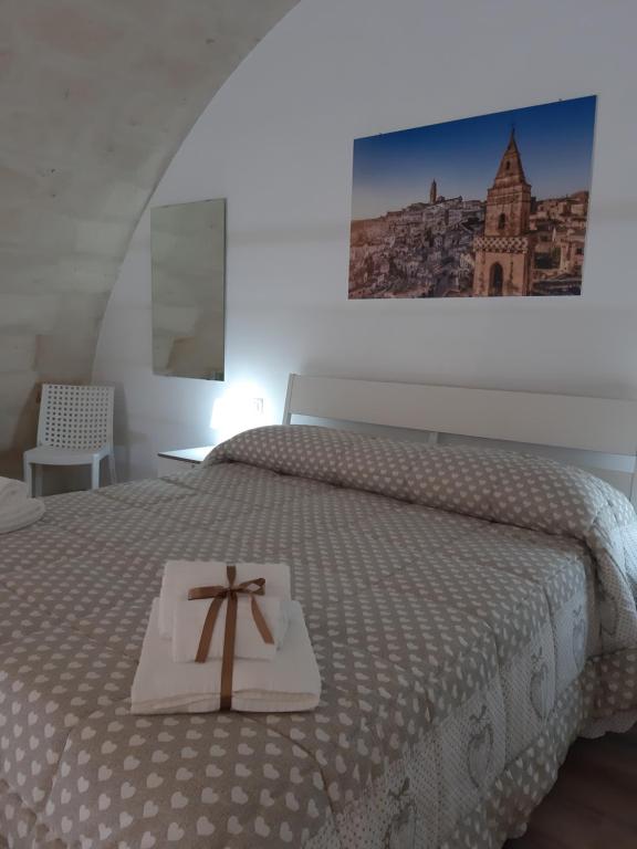 Postel nebo postele na pokoji v ubytování Sulle note dei Sassi Holiday Home