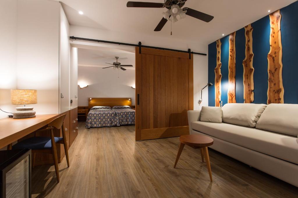Postel nebo postele na pokoji v ubytování Hotel Ca Marí