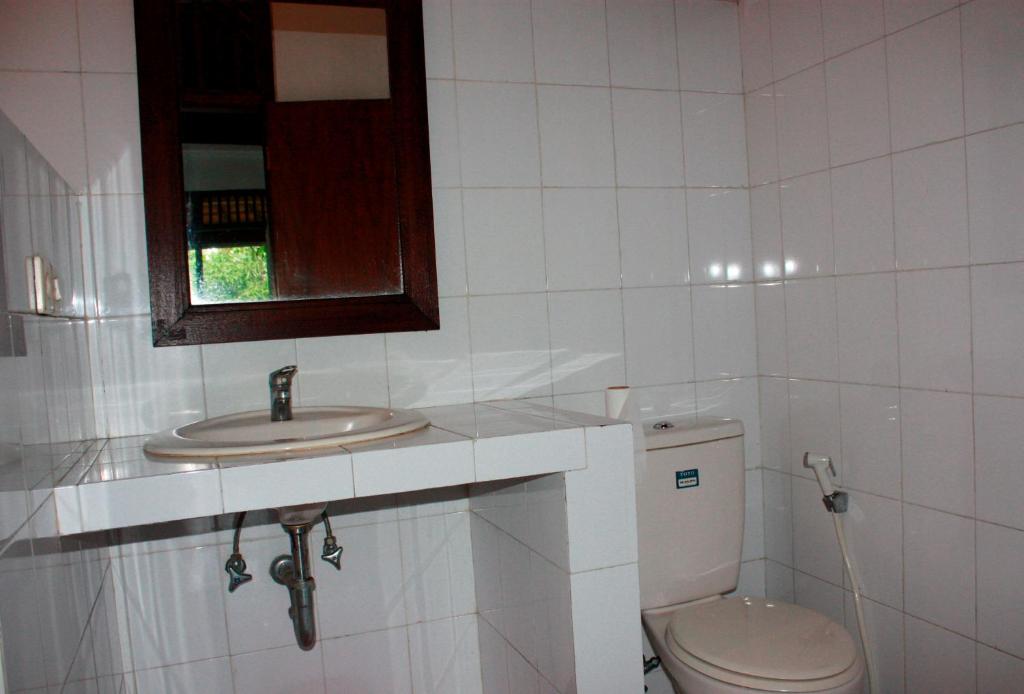 Koupelna v ubytování Raka Rai Bungalows