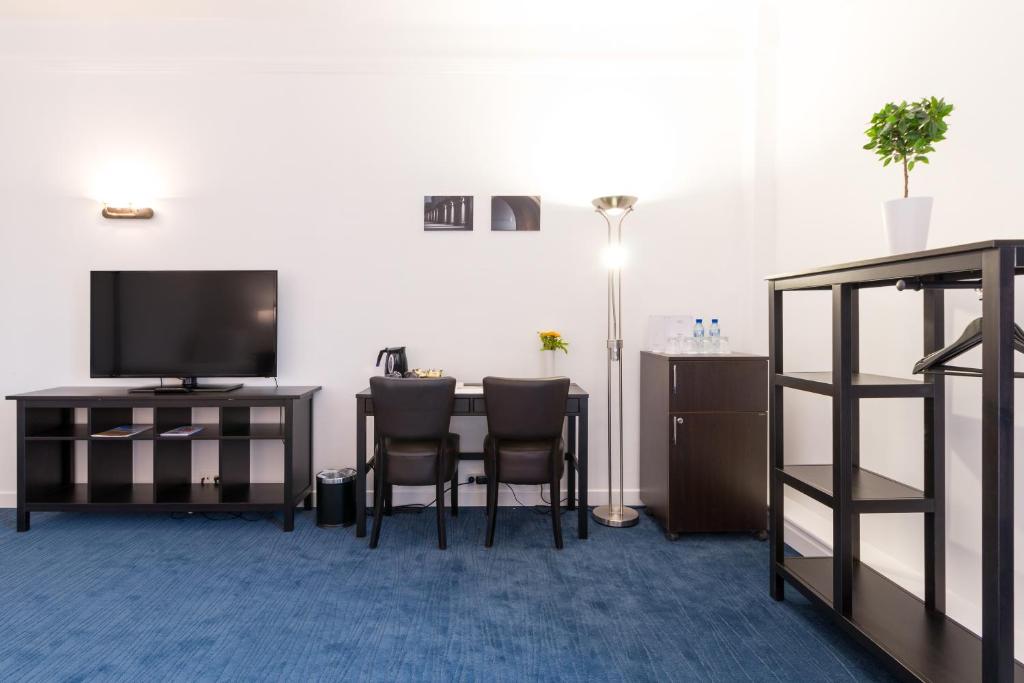 TV a/nebo společenská místnost v ubytování Thermae Palace