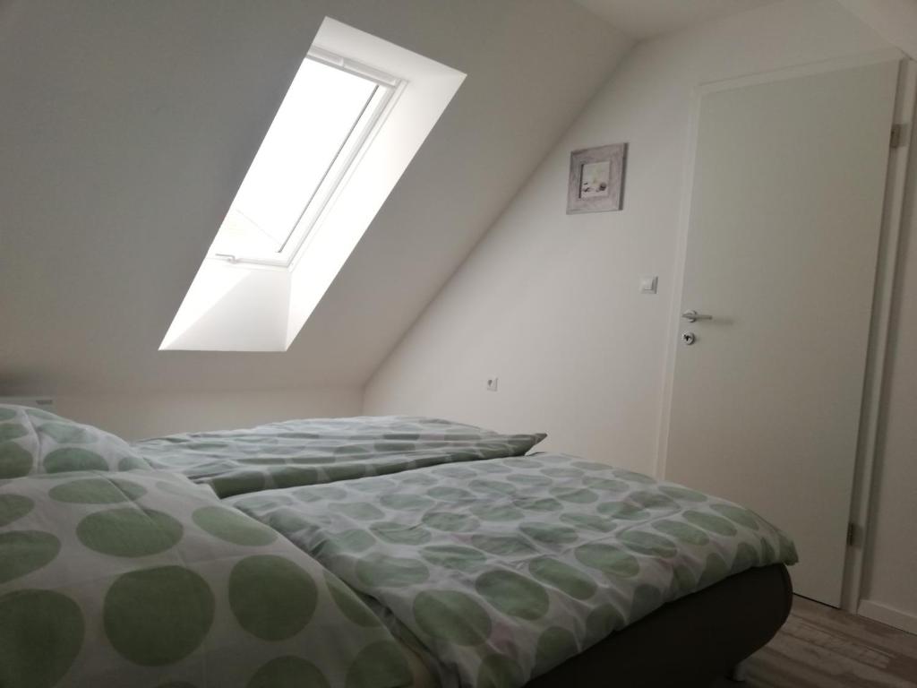 Postel nebo postele na pokoji v ubytování Apartma Stela in Terme Čatež