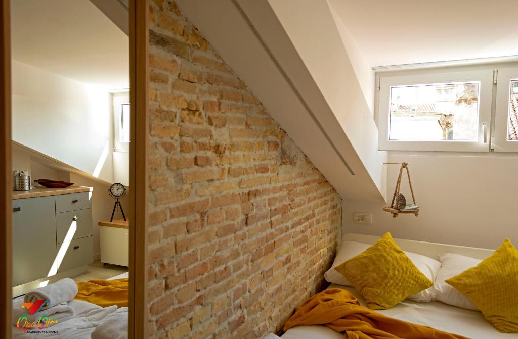 Postel nebo postele na pokoji v ubytování Apartments Opa Opa