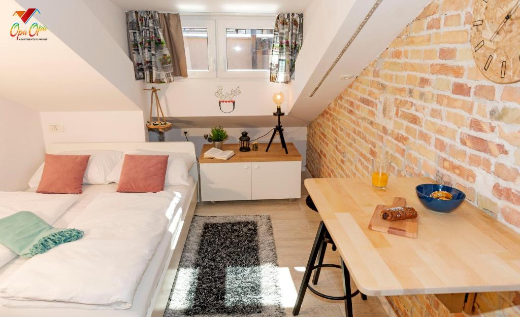 Postel nebo postele na pokoji v ubytování Apartments Opa Opa