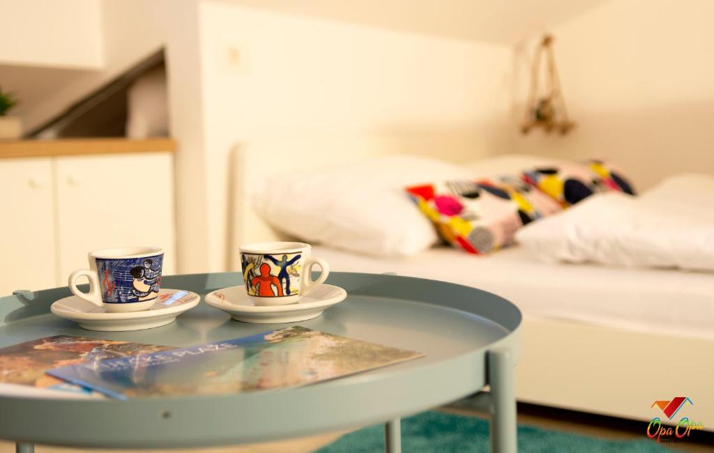 Postel nebo postele na pokoji v ubytování Apartments Opa Opa