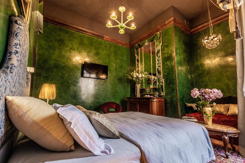 Postel nebo postele na pokoji v ubytování Avogaria 5 Rooms