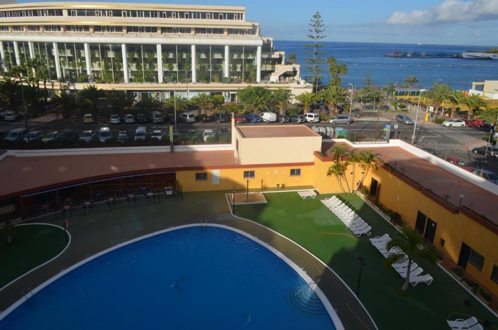 a view of a building with a swimming pool at Los Angeles in Los Cristianos