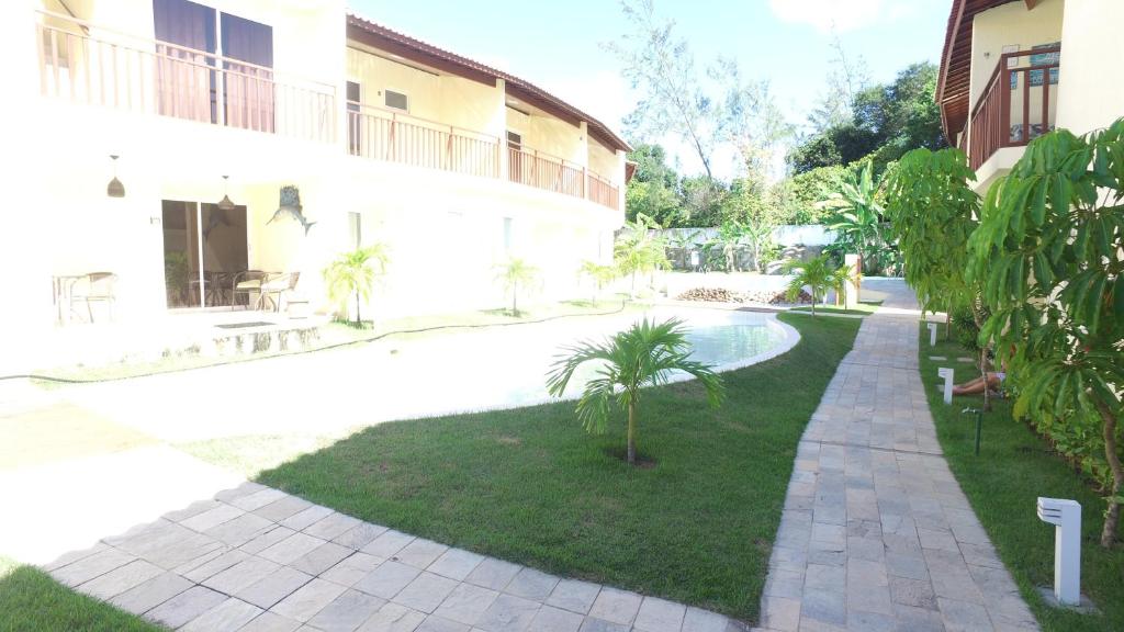  Flat completo e bem localizado no Solar Água Pipa por Carpediem