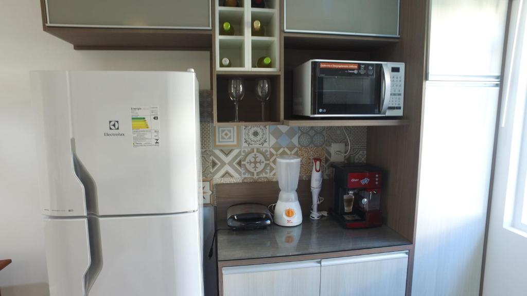  Flat completo e bem localizado no Solar Água Pipa por Carpediem
