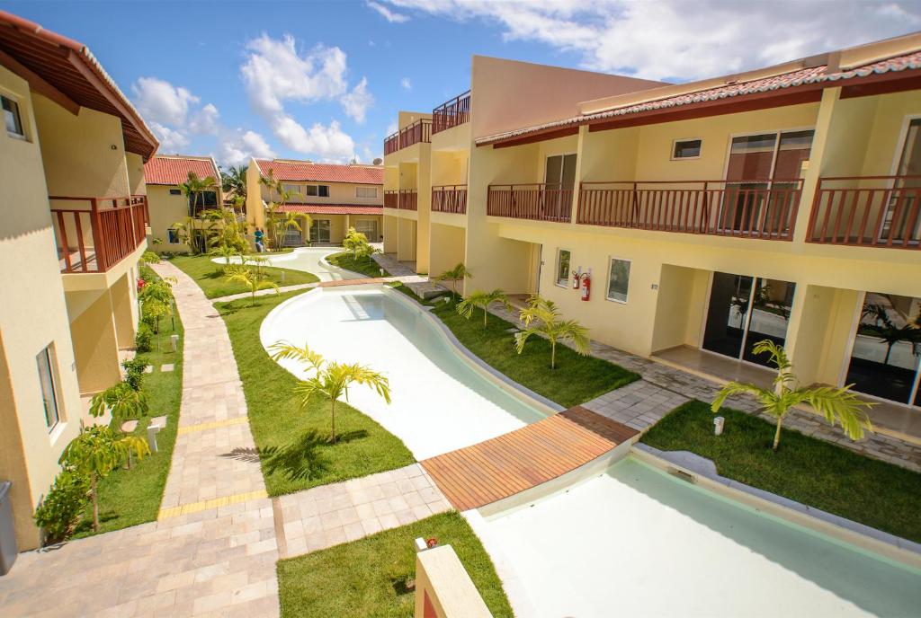  Flat completo e bem localizado no Solar Água Pipa por Carpediem