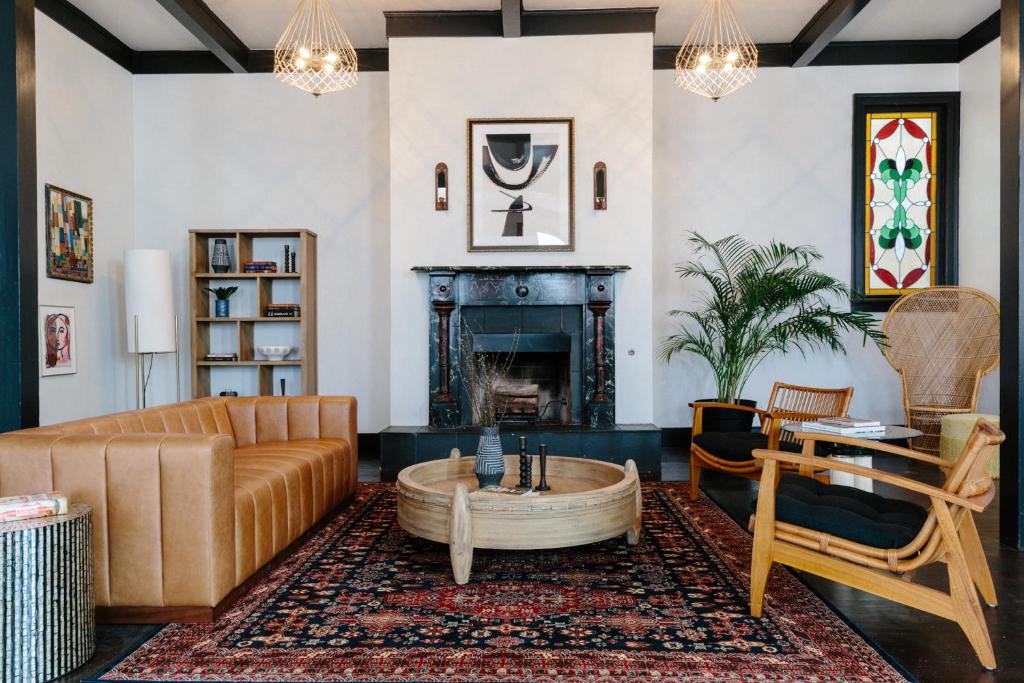 a living room with a couch and a fireplace at Sonder Hayes Valley in San Francisco