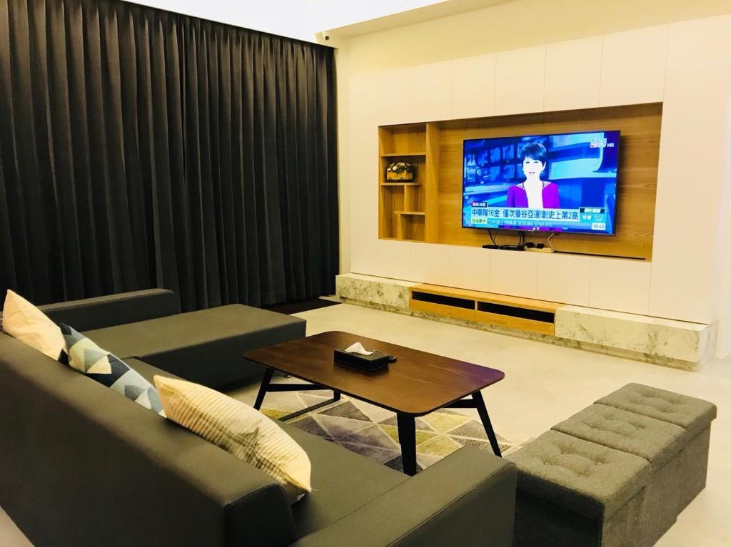 TV a/nebo společenská místnost v ubytování Araucaria Residence