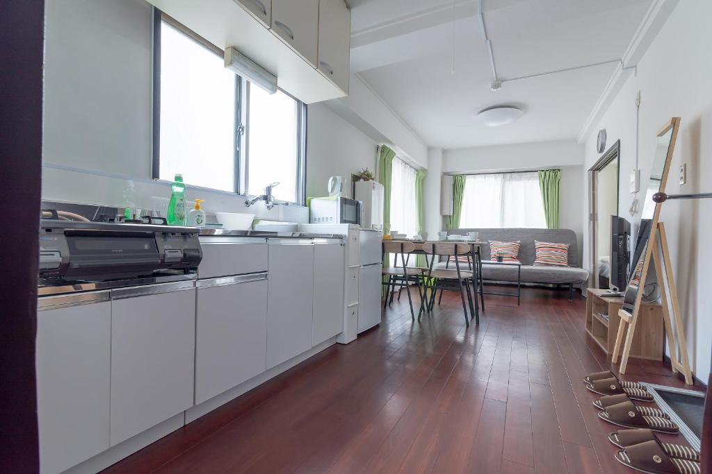 Kuchyň nebo kuchyňský kout v ubytování Uhome Iriya Apartment