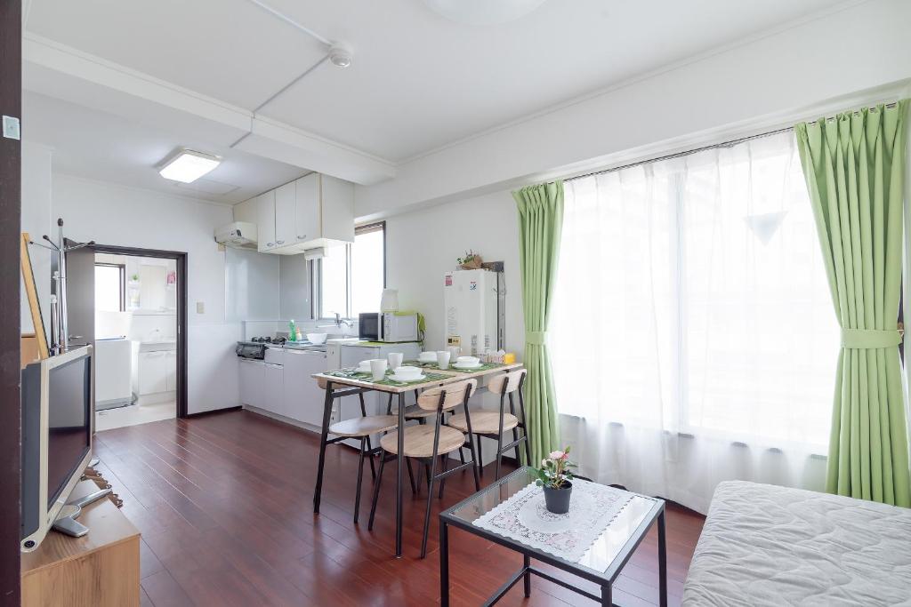 Kuchyň nebo kuchyňský kout v ubytování Uhome Iriya Apartment