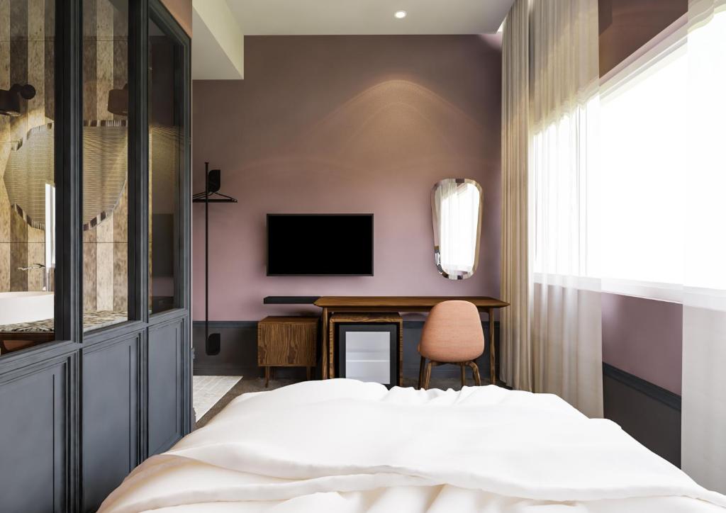 TV a/nebo společenská místnost v ubytování The Jesselton Hotel