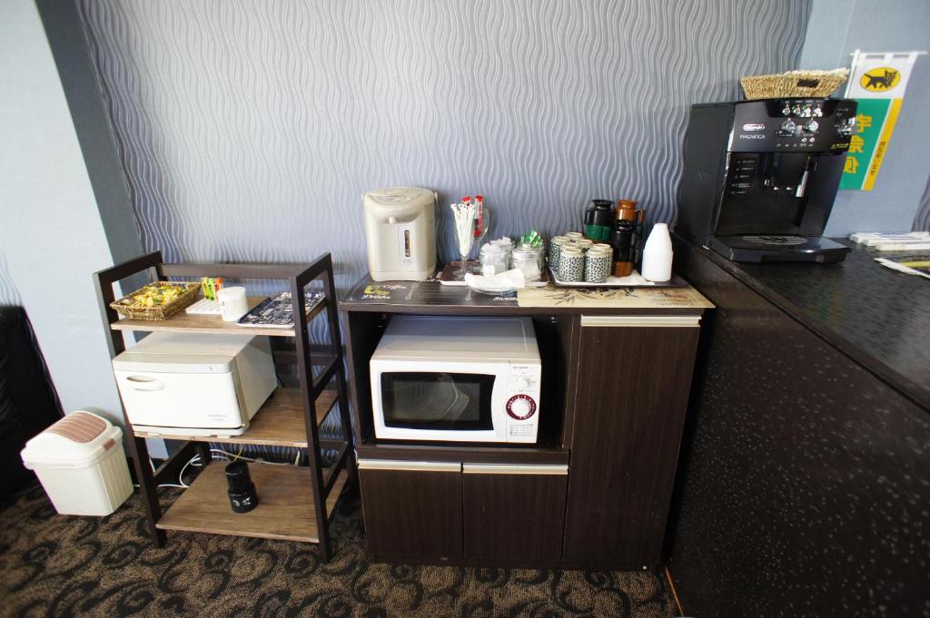 Kuchyň nebo kuchyňský kout v ubytování Hotel Free Style