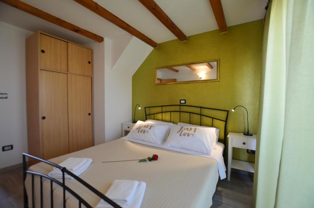 Łóżko lub łóżka w pokoju w obiekcie Guesthouse Mila