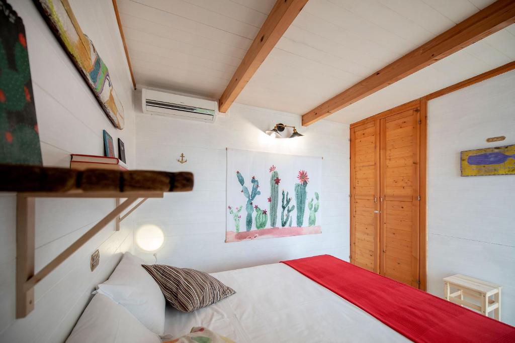 Postel nebo postele na pokoji v ubytování Maresia Rooms