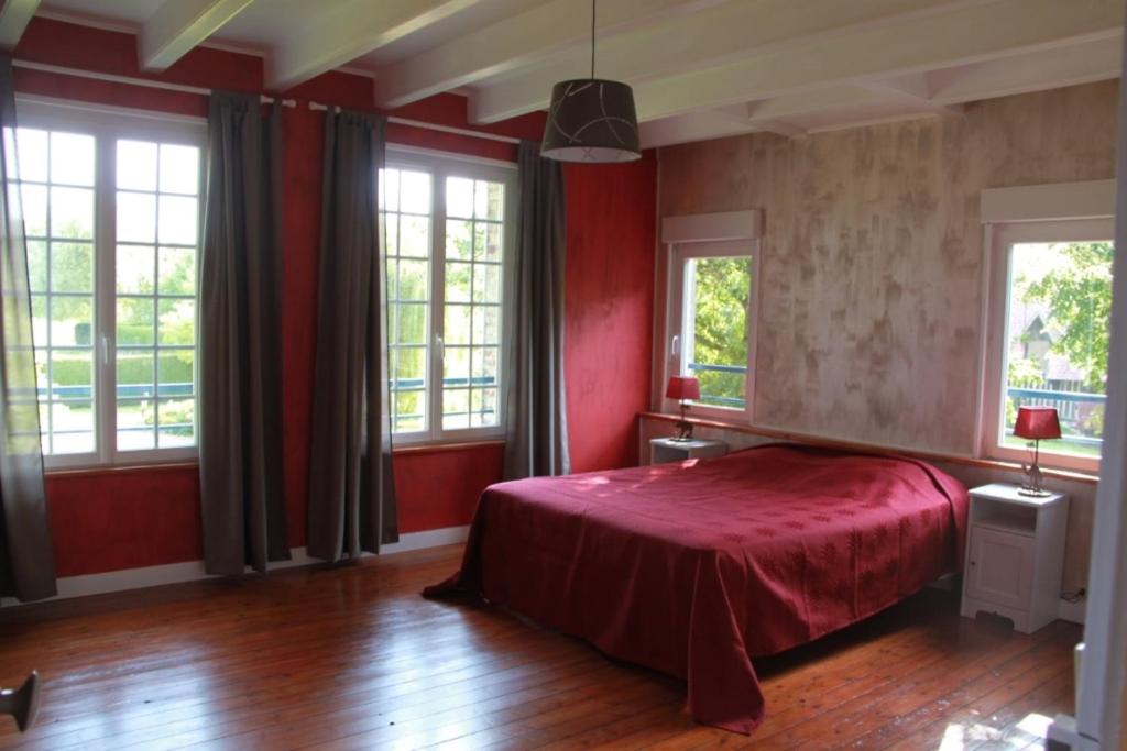 Postel nebo postele na pokoji v ubytování Chambres d'hôtes Manoir du Buquet