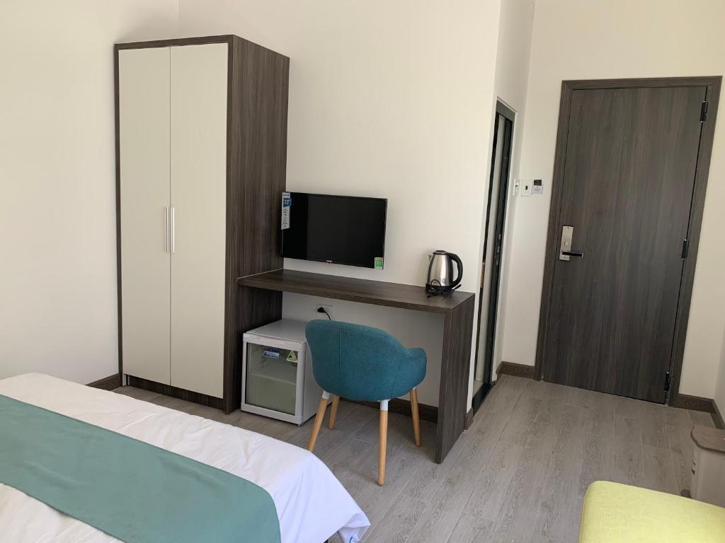 Postel nebo postele na pokoji v ubytování Home Thiên Trang 3