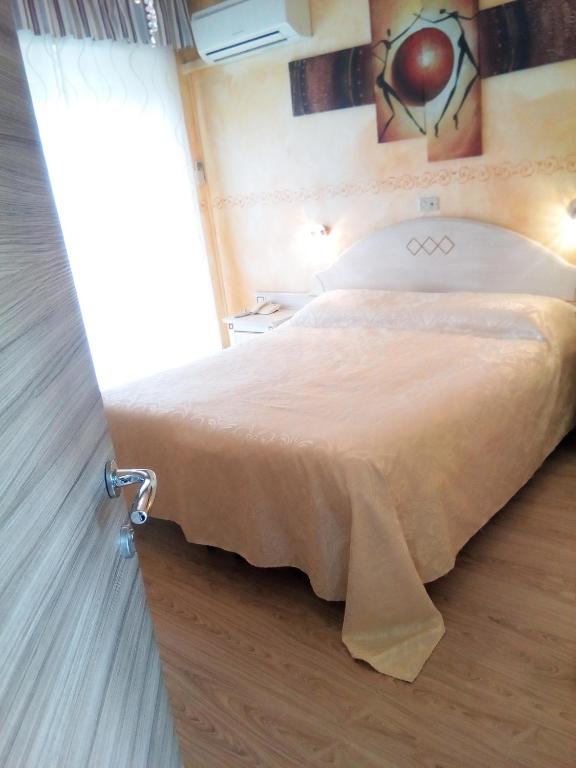 Postel nebo postele na pokoji v ubytování Hotel Eva La Romantica