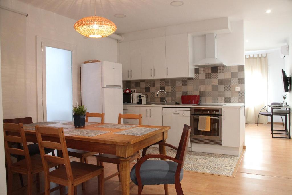 Kuchyň nebo kuchyňský kout v ubytování Apartaments IXA