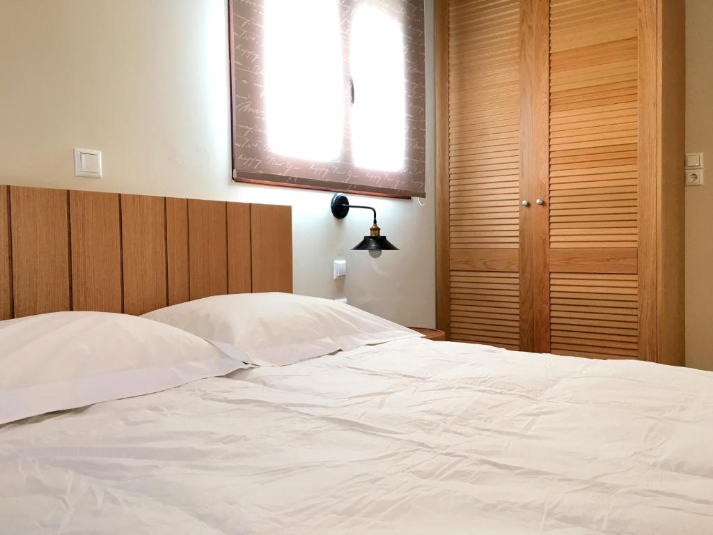 Posteľ alebo postele v izbe v ubytovaní Aria Monte Villas