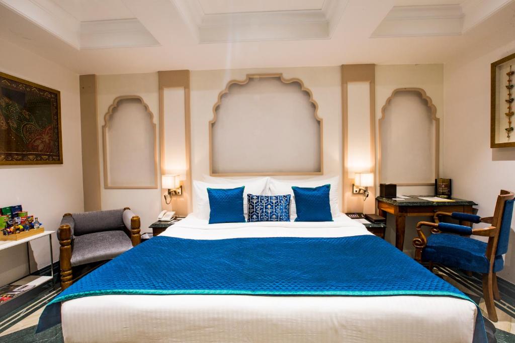 Uma cama ou camas num quarto em Hotel Bawa Continental