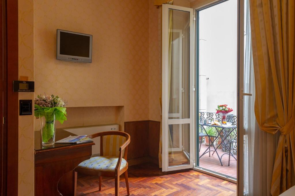TV a/nebo společenská místnost v ubytování Hotel Boccaccio