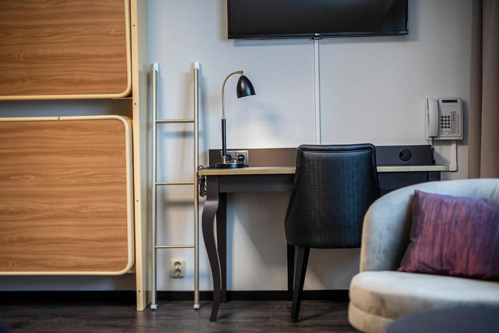 TV a/nebo společenská místnost v ubytování First Hotel Royal