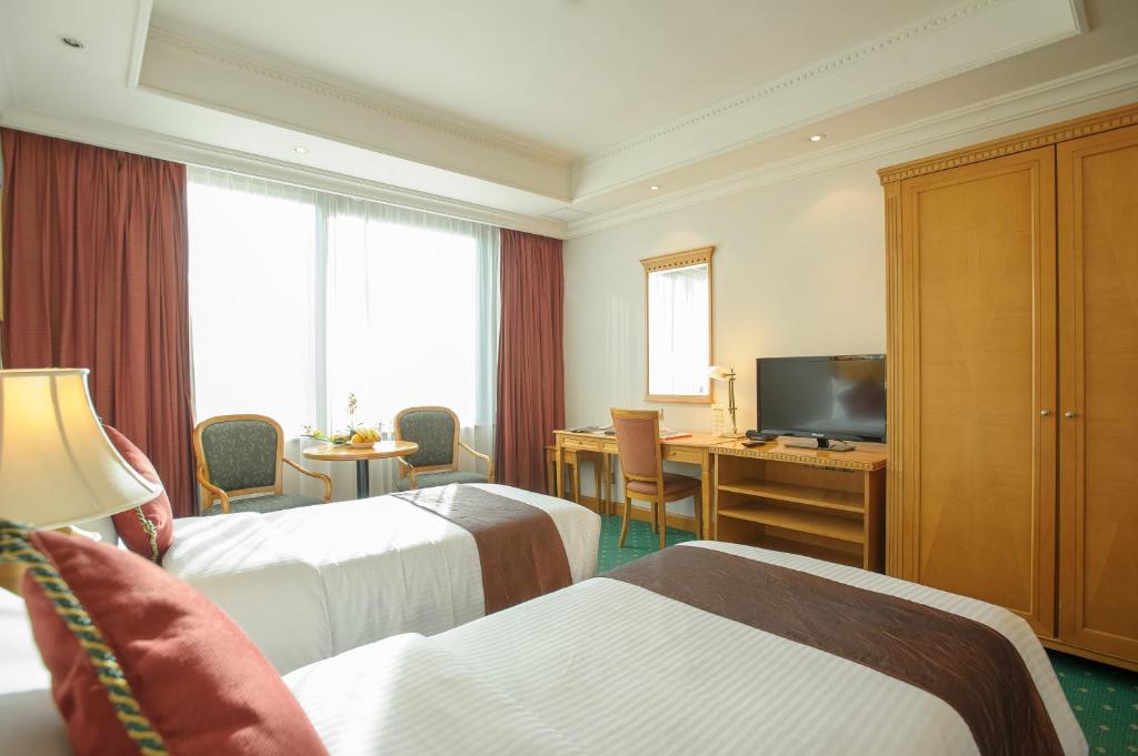 BEST WESTERN PLUS Hotel Hong Kongにあるテレビまたはエンターテインメントセンター