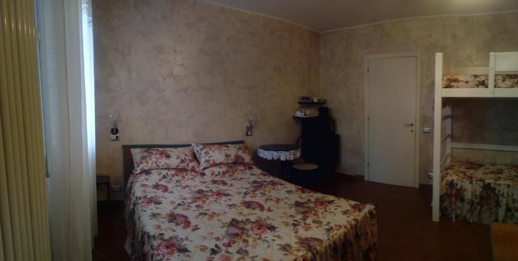 Postel nebo postele na pokoji v ubytování Villa Fabbri
