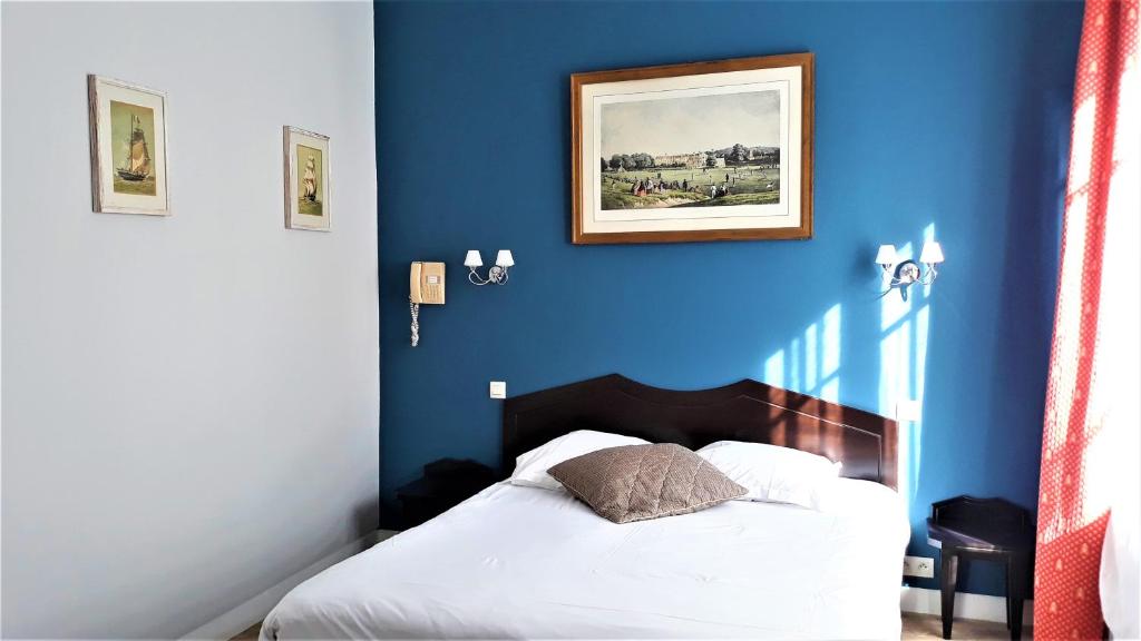 Postel nebo postele na pokoji v ubytování Hotel Le Reynita