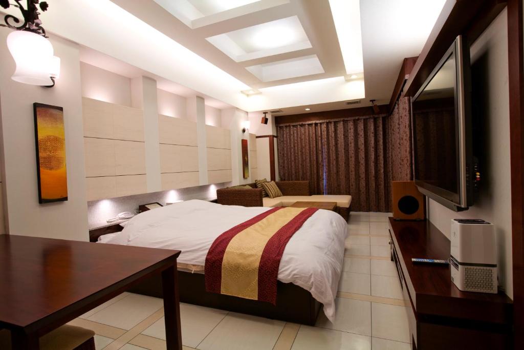 Postel nebo postele na pokoji v ubytování Hotel Bintang Pari Resort (Adult Only)