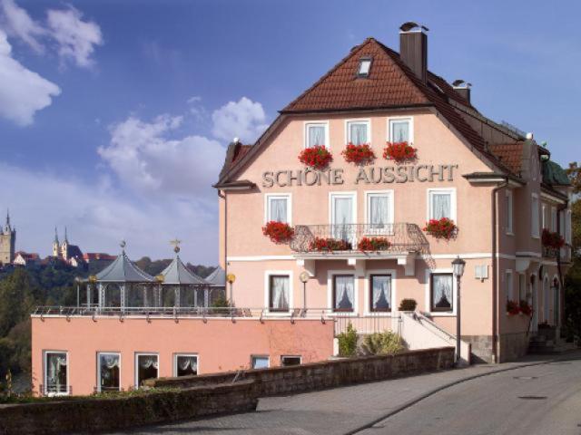 a building with a storeagent sign on the side of it at Schöne Aussicht in Bad Friedrichshall
