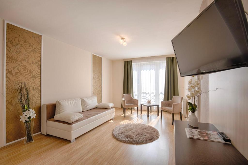 Posezení v ubytování Triple M Hotel